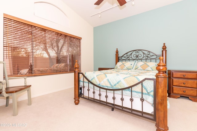4161 W Diamond Butte Ct, Tucson, AZ 85745 - carpeted bedroom with lofted ceiling, rail lighting, and ceiling fan