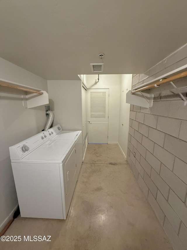 1001 E 17th St Apt 106, Tucson, AZ 85719 - clothes washing area with washer and clothes dryer