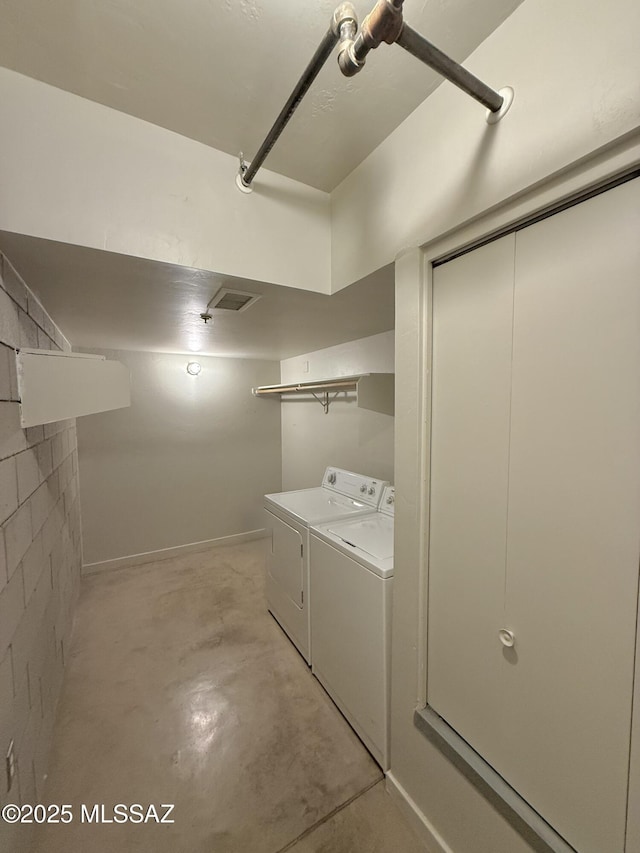 1001 E 17th St Apt 106, Tucson, AZ 85719 - laundry room featuring separate washer and dryer