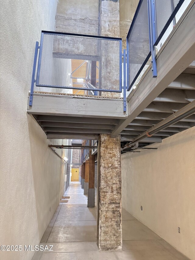 1001 E 17th St Apt 106, Tucson, AZ 85719 - stairway with a textured wall