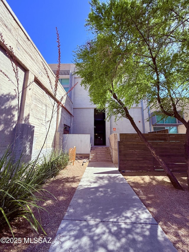 1001 E 17th St Apt 106, Tucson, AZ 85719 - view of exterior entry with fence