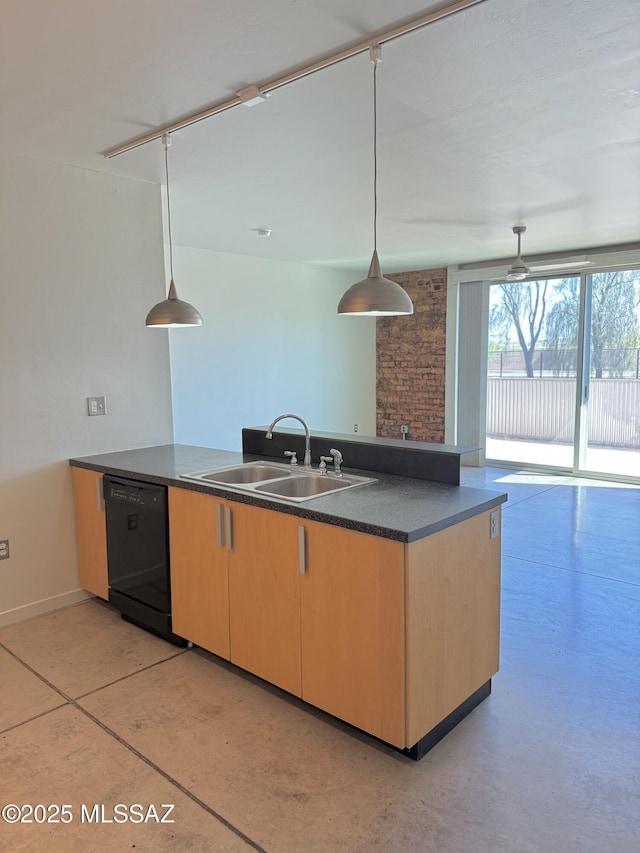 1001 E 17th St Apt 106, Tucson, AZ 85719 - kitchen featuring a sink, black dishwasher, light brown cabinetry, dark countertops, and decorative light fixtures