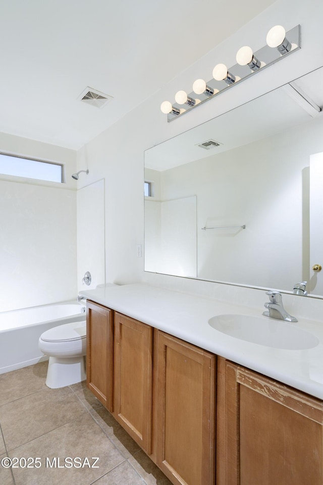 803 W Calle Muro Fuerte Dr, Sahuarita, AZ 85629 - bathroom with vanity, toilet, shower / bathtub combination, and tile patterned flooring