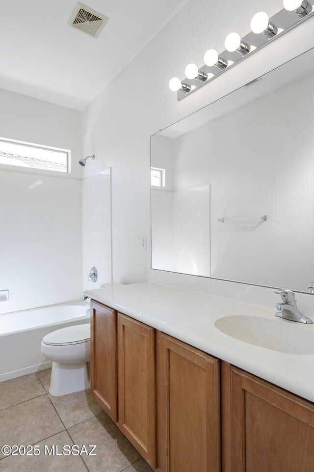 803 W Calle Muro Fuerte Dr, Sahuarita, AZ 85629 - full bath with vanity, toilet, tile patterned floors, and shower / bath combination