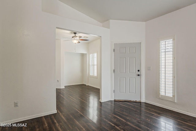 foyer with dark wood-style floors, ceiling fan, and baseboards