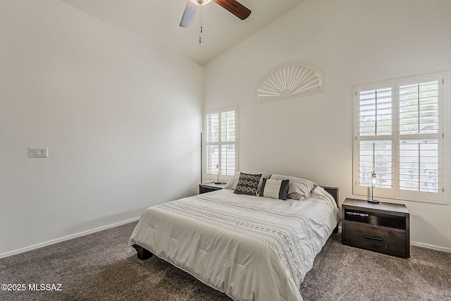 bedroom with carpet floors, multiple windows, high vaulted ceiling, baseboards, and a ceiling fan