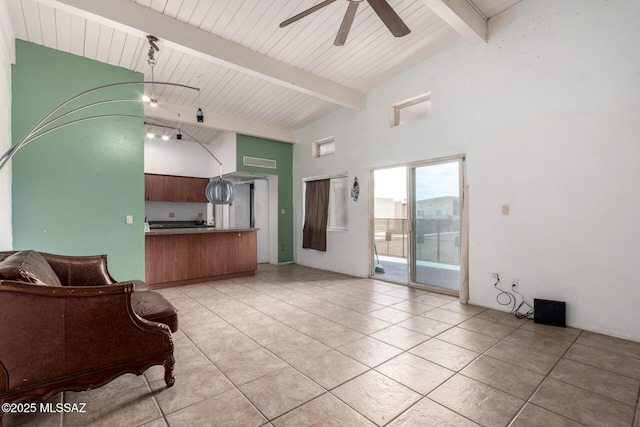 living area with high vaulted ceiling, ceiling fan, beamed ceiling, and light tile patterned floors