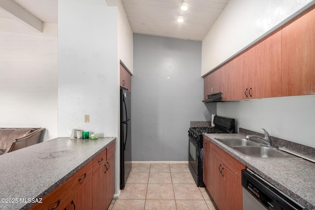 kitchen with black appliances, a sink, under cabinet range hood, light tile patterned floors, and baseboards