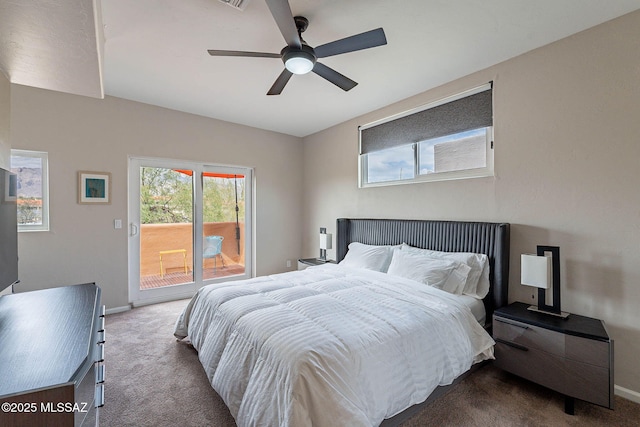 4296 N Rillito Creek Pl, Tucson, AZ 85719 - bedroom featuring carpet floors, access to exterior, and baseboards