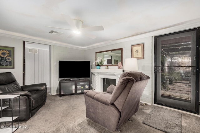 8360 E Mary Dr, Tucson, AZ 85730 - carpeted living area featuring ornamental molding and ceiling fan
