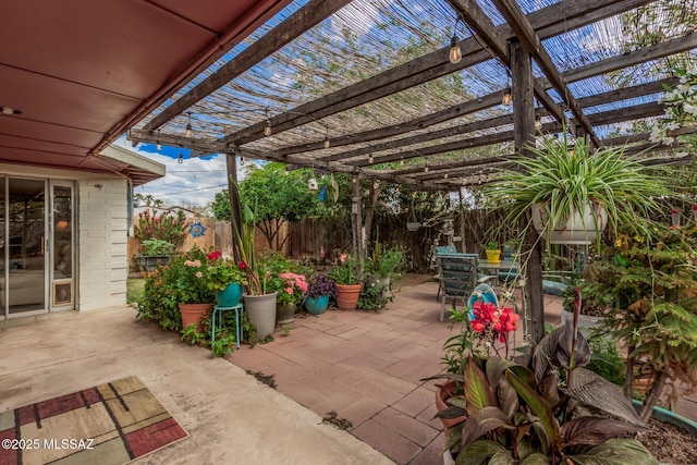 8360 E Mary Dr, Tucson, AZ 85730 - view of patio featuring a fenced backyard, outdoor dining space, and a pergola
