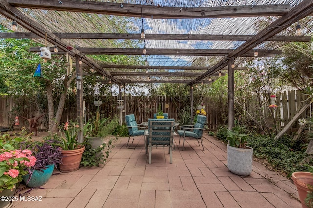 8360 E Mary Dr, Tucson, AZ 85730 - view of patio / terrace featuring a pergola, outdoor dining area, and a fenced backyard