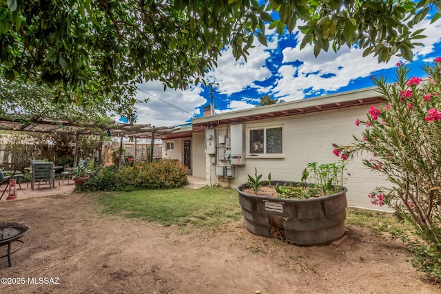 8360 E Mary Dr, Tucson, AZ 85730 - back of house with a pergola, a patio, concrete block siding, and fence