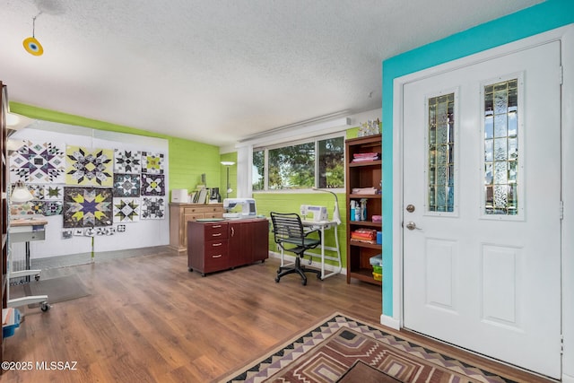 8360 E Mary Dr, Tucson, AZ 85730 - office area featuring a textured ceiling and wood finished floors