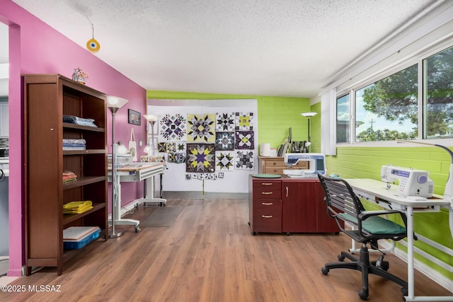 8360 E Mary Dr, Tucson, AZ 85730 - office space featuring a textured ceiling and wood finished floors