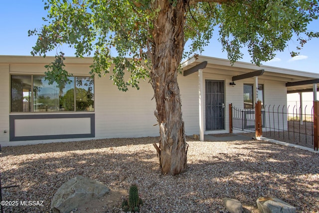 6664 E Mary Dr, Tucson, AZ 85730 - rear view of property featuring fence
