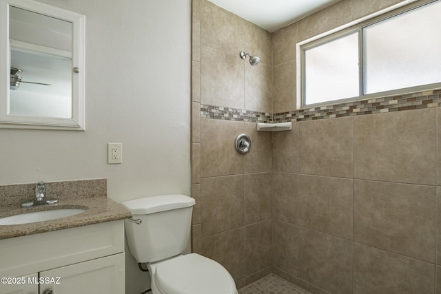 6664 E Mary Dr, Tucson, AZ 85730 - bathroom with vanity, tiled shower, and toilet