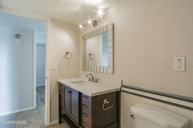 6664 E Mary Dr, Tucson, AZ 85730 - bathroom featuring vanity, tile patterned floors, and toilet
