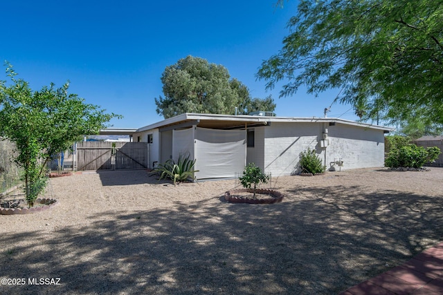 6664 E Mary Dr, Tucson, AZ 85730 - view of front of property with a gate and fence