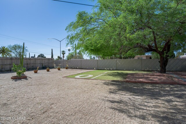 6664 E Mary Dr, Tucson, AZ 85730 - view of yard featuring fence