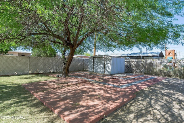 6664 E Mary Dr, Tucson, AZ 85730 - fenced backyard with a storage shed, an outbuilding, and a patio area