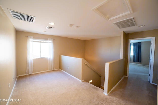 14333 S Camino Vallado, Sahuarita, AZ 85629 - carpeted empty room with baseboards, attic access, and recessed lighting