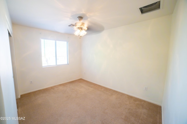 14333 S Camino Vallado, Sahuarita, AZ 85629 - empty room with light colored carpet, ceiling fan, and baseboards
