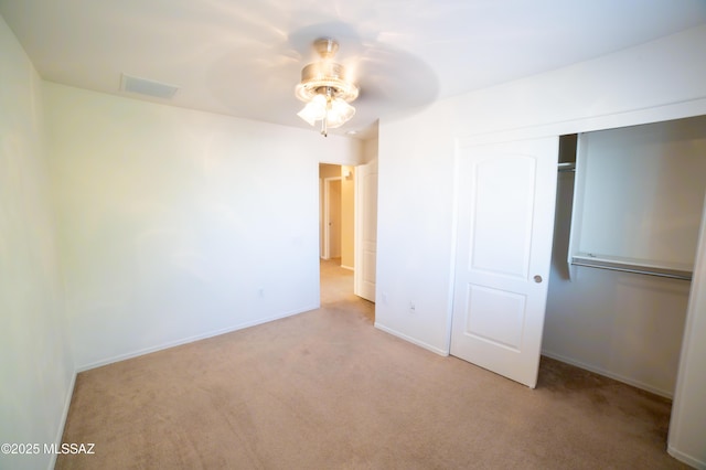 14333 S Camino Vallado, Sahuarita, AZ 85629 - unfurnished bedroom with carpet floors, a closet, baseboards, and ceiling fan