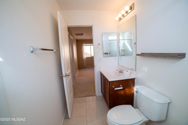 14333 S Camino Vallado, Sahuarita, AZ 85629 - bathroom with toilet, tile patterned flooring, and vanity