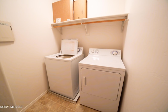 14333 S Camino Vallado, Sahuarita, AZ 85629 - clothes washing area featuring washing machine and dryer and baseboards