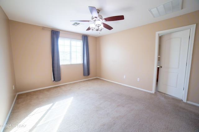 14333 S Camino Vallado, Sahuarita, AZ 85629 - unfurnished room featuring carpet floors, a ceiling fan, and baseboards
