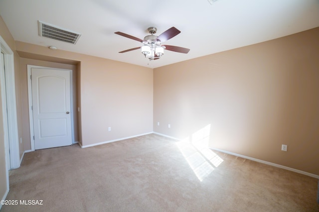 14333 S Camino Vallado, Sahuarita, AZ 85629 - spare room with carpet flooring, ceiling fan, and baseboards