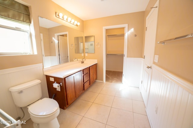 14333 S Camino Vallado, Sahuarita, AZ 85629 - full bath with wainscoting, toilet, tile patterned floors, and vanity