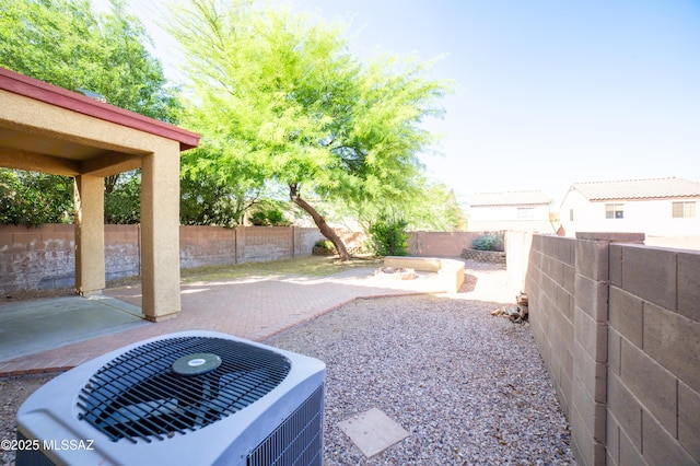 14333 S Camino Vallado, Sahuarita, AZ 85629 - fenced backyard with central AC unit and a patio area