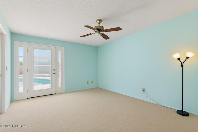 2831 W Puccini Pl, Tucson, AZ 85741 - unfurnished room featuring carpet flooring and a ceiling fan