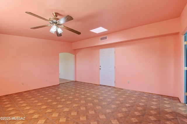 2831 W Puccini Pl, Tucson, AZ 85741 - spare room featuring arched walkways and ceiling fan