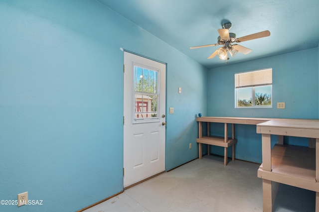 2831 W Puccini Pl, Tucson, AZ 85741 - entrance foyer featuring plenty of natural light, finished concrete floors, and ceiling fan