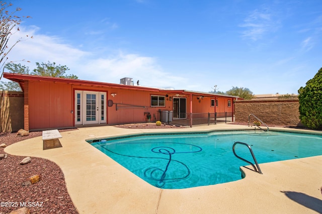 2831 W Puccini Pl, Tucson, AZ 85741 - view of pool with a patio, french doors, and fence
