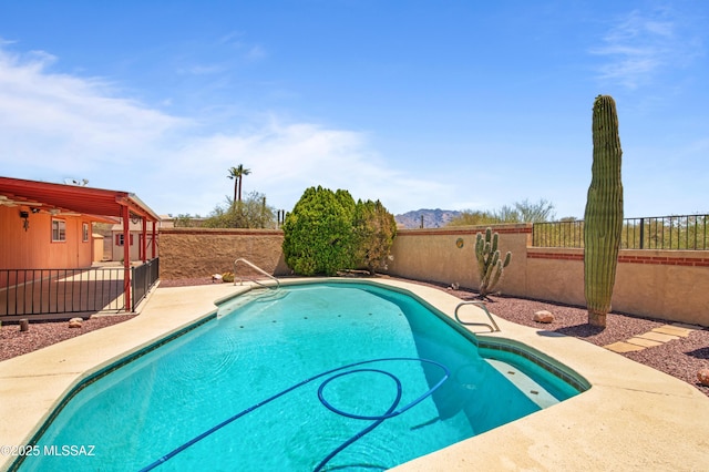 2831 W Puccini Pl, Tucson, AZ 85741 - view of pool featuring a fenced backyard, a patio area, and a mountain view