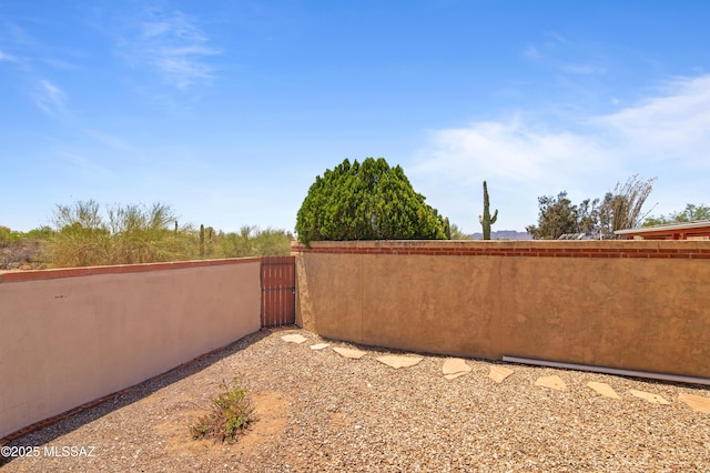 2831 W Puccini Pl, Tucson, AZ 85741 - view of yard with a gate and fence