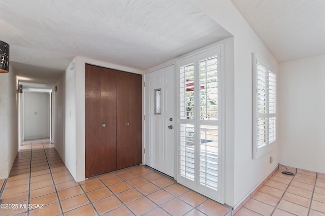 2831 W Puccini Pl, Tucson, AZ 85741 - foyer featuring light tile patterned floors and plenty of natural light