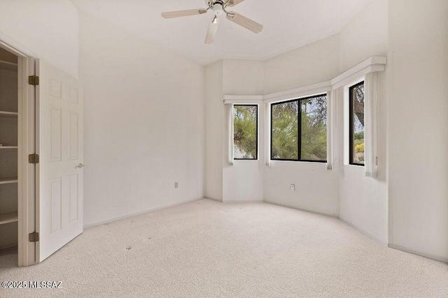 11126 N Guava Dr, Oro Valley, AZ 85737 - spare room with carpet and a ceiling fan