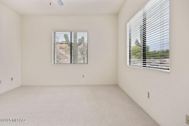 11126 N Guava Dr, Oro Valley, AZ 85737 - carpeted empty room featuring a ceiling fan