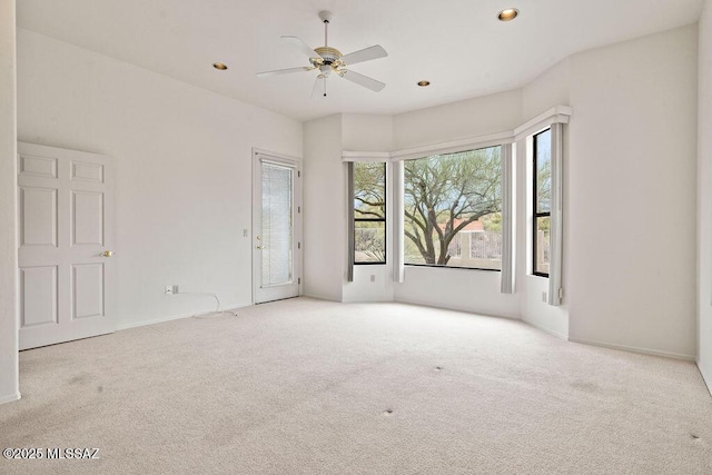 11126 N Guava Dr, Oro Valley, AZ 85737 - carpeted empty room featuring a ceiling fan, recessed lighting, and baseboards