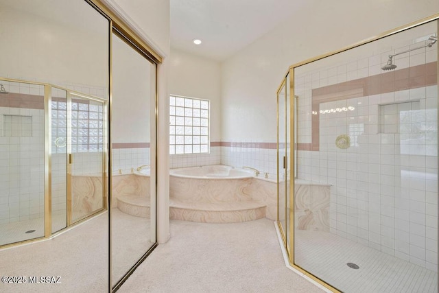 11126 N Guava Dr, Oro Valley, AZ 85737 - full bath with a stall shower, tile walls, a garden tub, a wainscoted wall, and recessed lighting