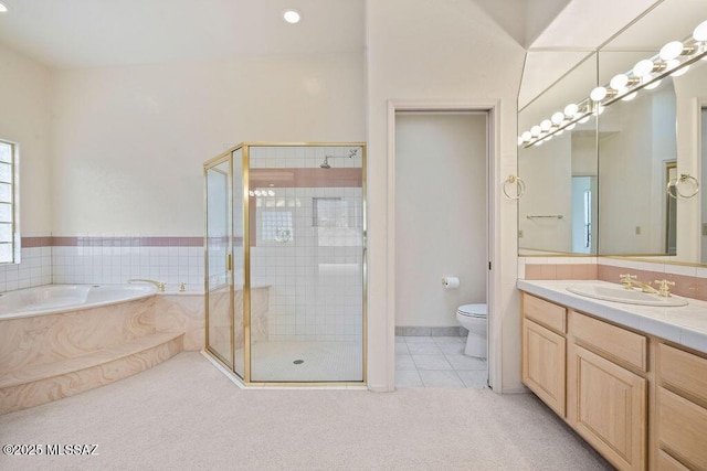 11126 N Guava Dr, Oro Valley, AZ 85737 - full bathroom with tile patterned floors, a stall shower, a bath, and toilet