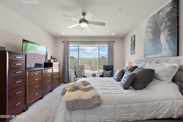 7809 S Land Grant Dr, Tucson, AZ 85747 - bedroom featuring light colored carpet, a ceiling fan, and recessed lighting