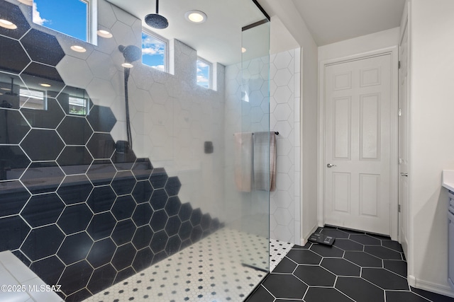 7809 S Land Grant Dr, Tucson, AZ 85747 - full bath featuring a walk in shower, tile patterned floors, and recessed lighting