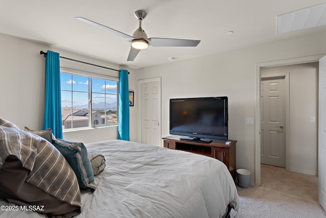7809 S Land Grant Dr, Tucson, AZ 85747 - carpeted bedroom with ceiling fan