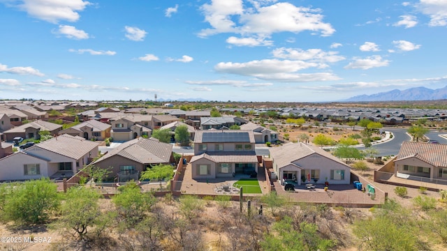 7809 S Land Grant Dr, Tucson, AZ 85747 - aerial perspective of suburban area featuring a mountainous background
